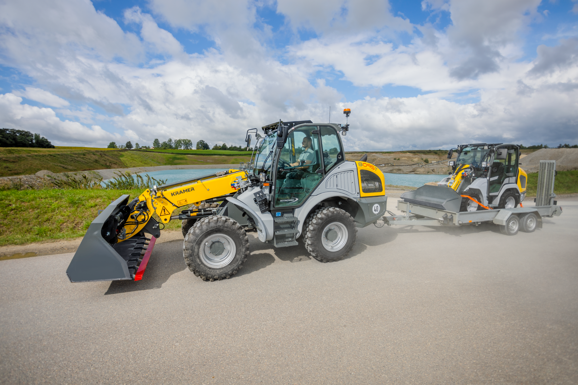 The Kramer telescopic wheel loader 8095T while transporting a trailer.